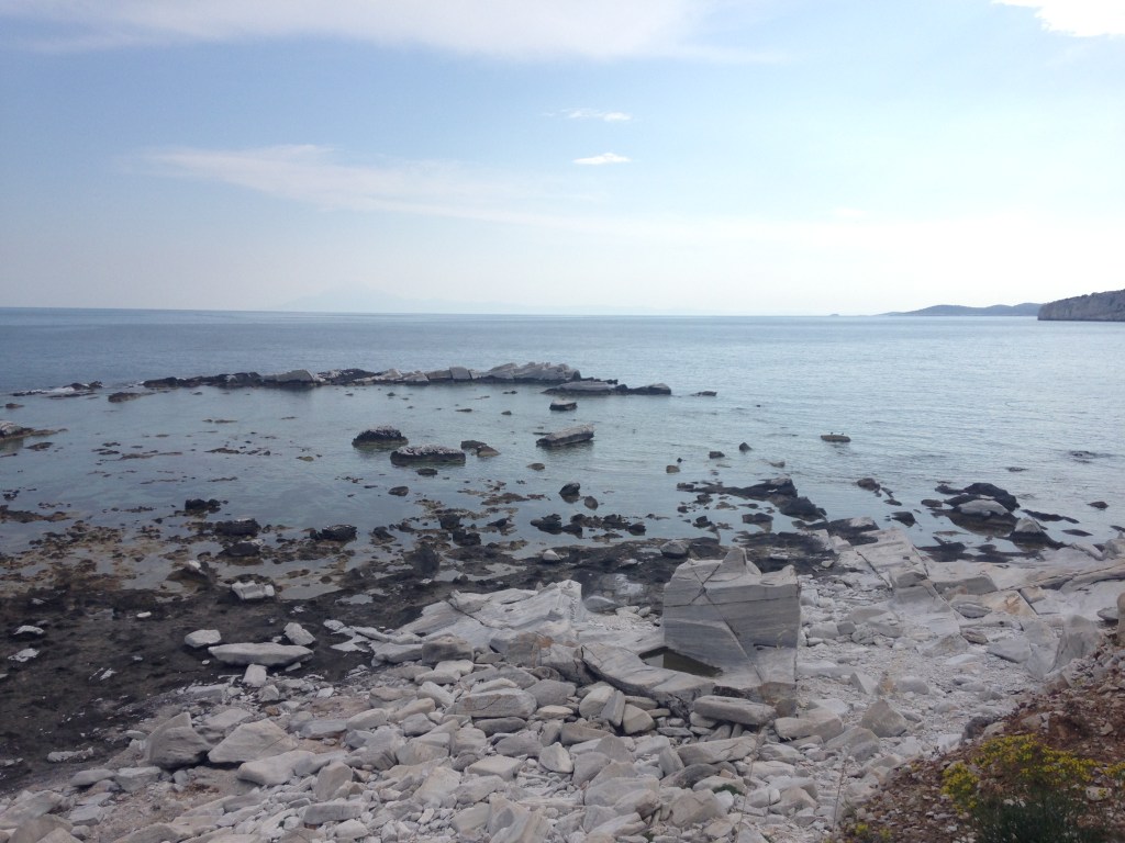 This is the corner I wanted to cut off, where that strip of rocks is along the back.